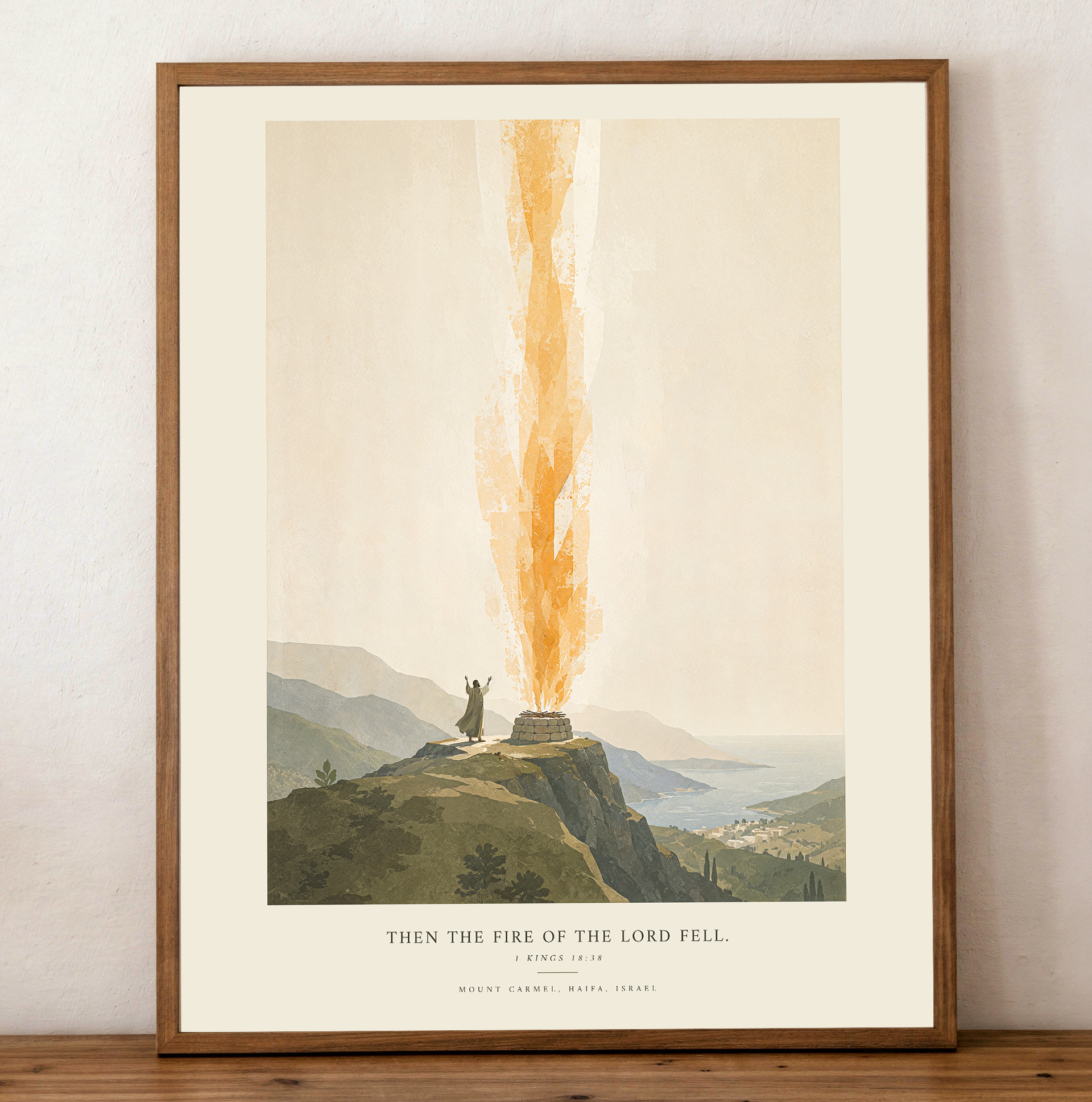 Framed artwork of a mountain scene with a fiery fall, displayed on a wall.