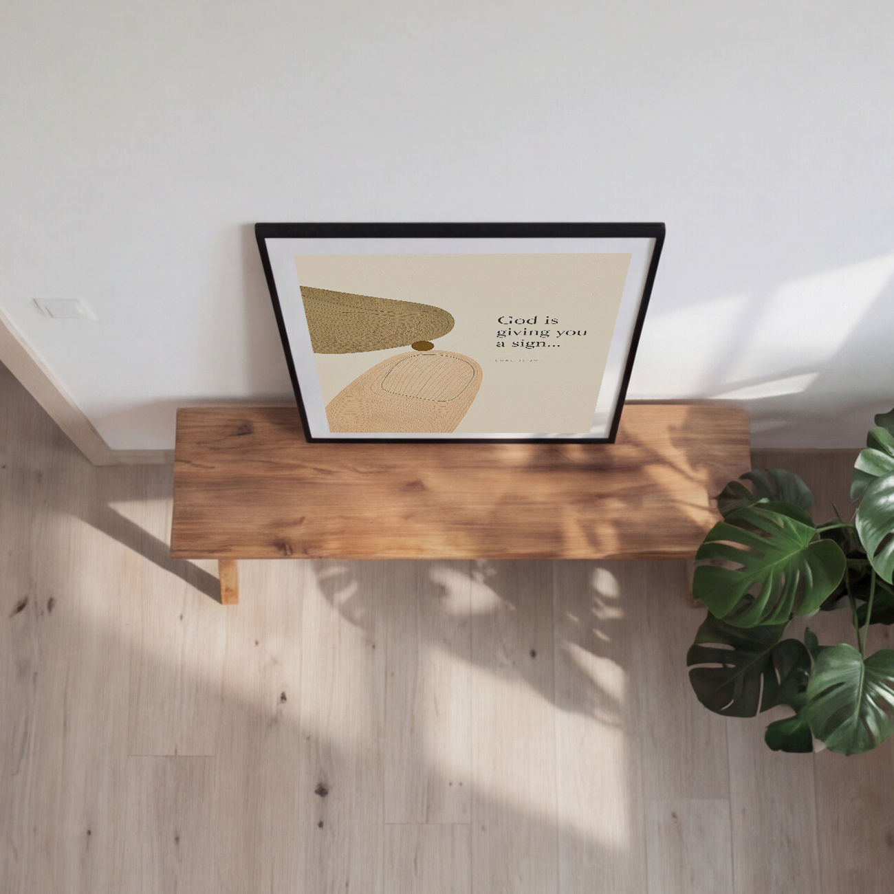 A framed minimalist art print with abstract shapes and the text 'God is giving you a sign.