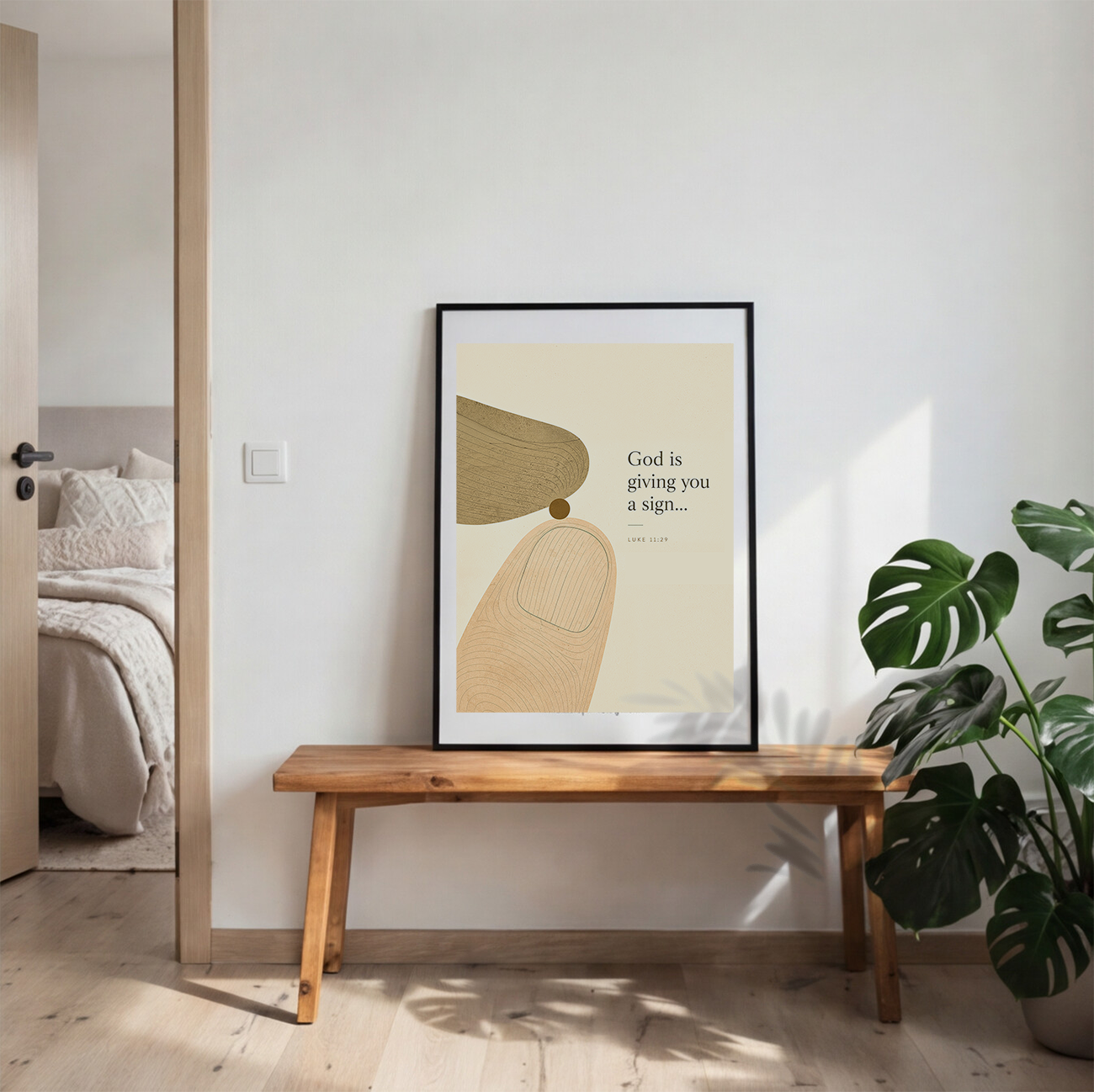 A framed minimalist art print with an abstract design and the quote 'God is giving you a sign.