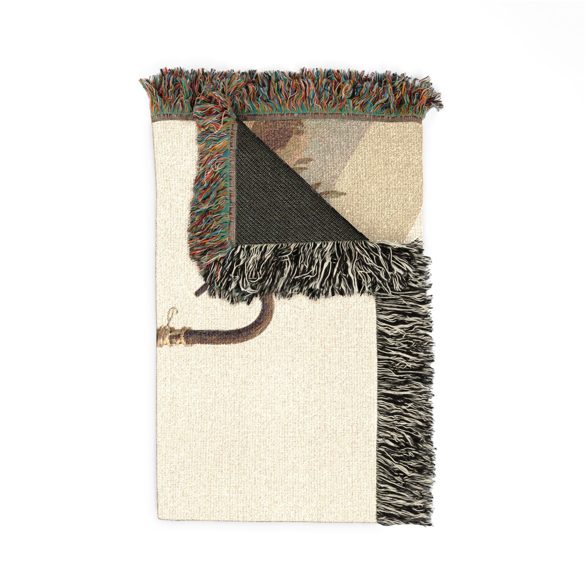 Decorative throw blanket with shell and leaf pattern on a white background